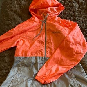 Columbia size small rain jacket. Peach orange top half grey bottom